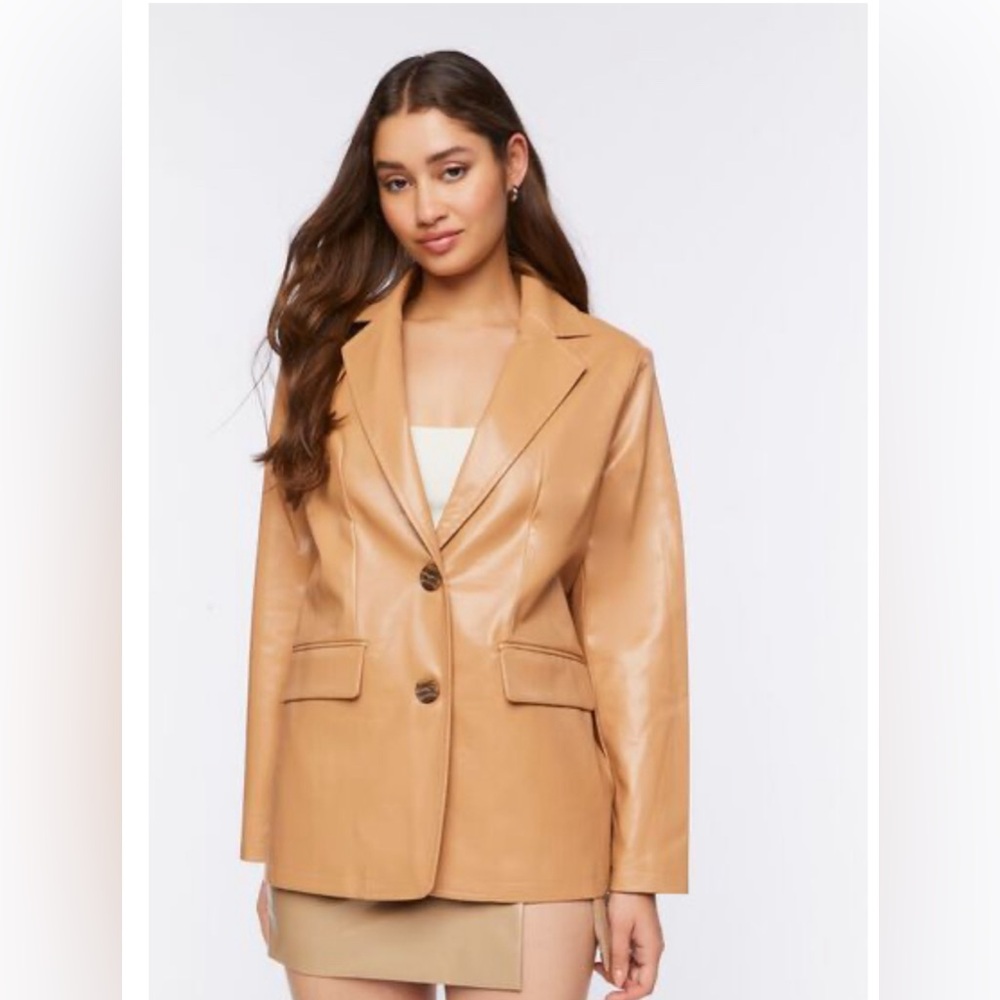 A faux leather blazer featuring notched lapels
